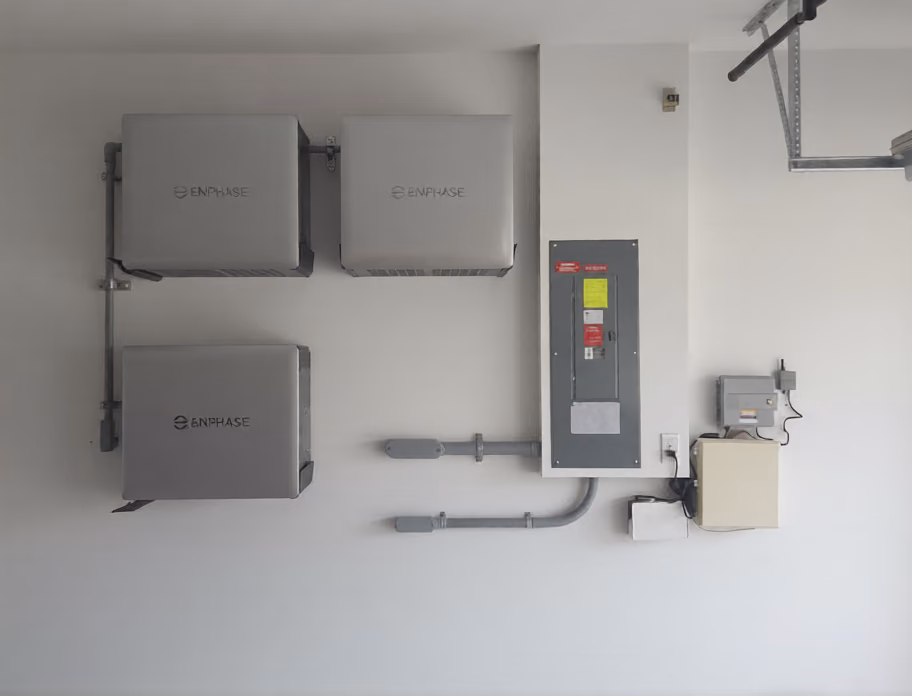 Three Enphase IQ Battery 10C units installed in a Tampa Bay area garage by May Electric Solar